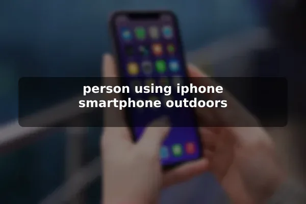 person using iphone smartphone outdoors